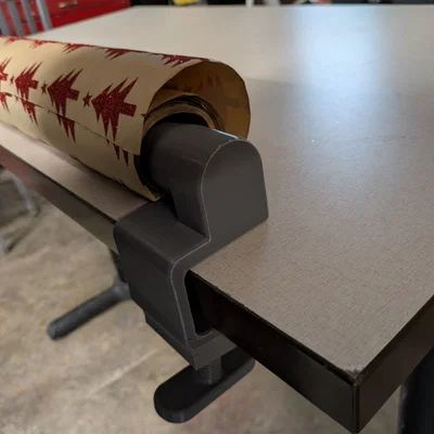 Dụng cụ gắn bàn giữ cuộn giấy gói quà