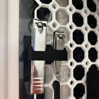 Multiboard - Giá treo kềm bấm móng tay