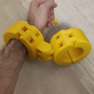 Còng tay có khớp nối, in liền khối (print in place)