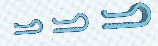 Bộ kẹp cố định cuộn giấy gói quà đa năng (Wrapping Paper Clips) - Image 2