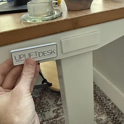 Miếng che ốc/plate logo trống cho Uplift Standing Desk V2