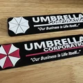 Nam châm tủ lạnh Logo Umbrella Corp (Resident Evil/Biohazard) - Bản in đa màu - Thumbnail 1