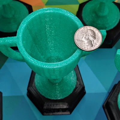 Cúp vinh danh MVP và Most Improved Player kèm bảng tên