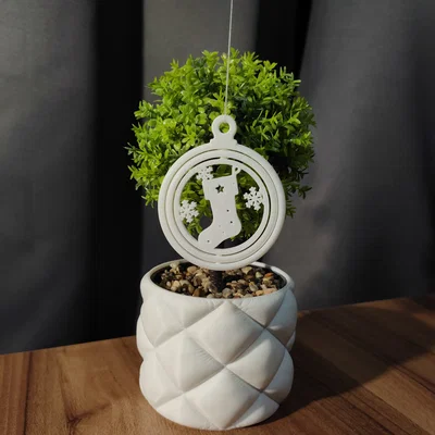 Đồ trang trí Giáng sinh xoay (cắt hình chiếc vớ)