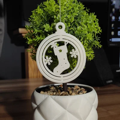 Đồ trang trí Giáng sinh xoay (cắt hình chiếc vớ)