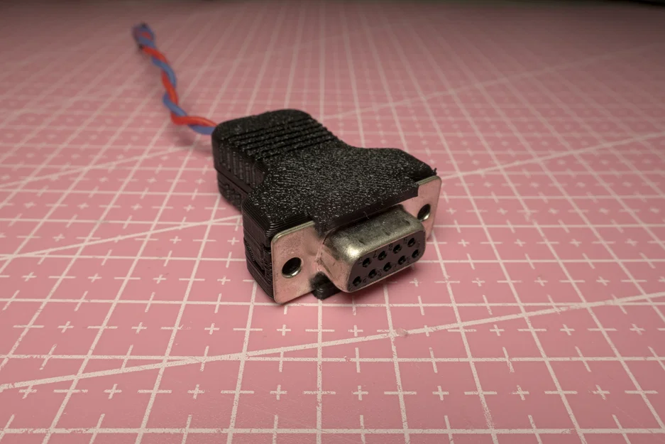 Vỏ bọc đầu nối DB-9 không cần ốc vít cho dự án điện tử - Image 1