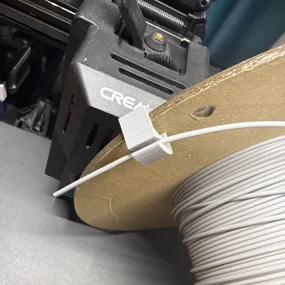 Kẹp giữ đầu sợi nhựa cho cuộn filament bìa carton 3D