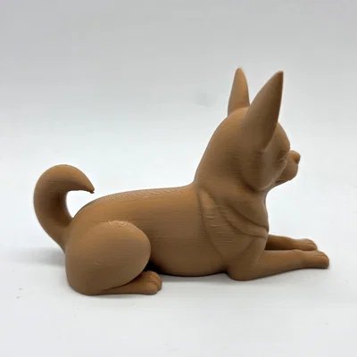 Mô hình tượng chú chó Chihuahua lông ngắn đang nằm