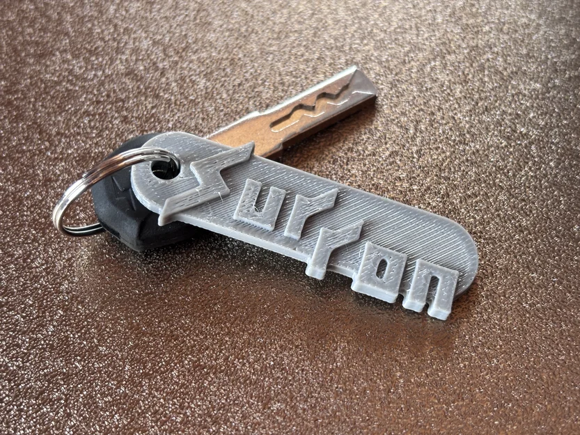 Móc khóa Surron thiết kế đẹp mắt - Phụ kiện 3D cho xe điện - Image 1