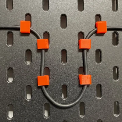 Kẹp giữ dây cáp cho bảng treo Ikea Skadis