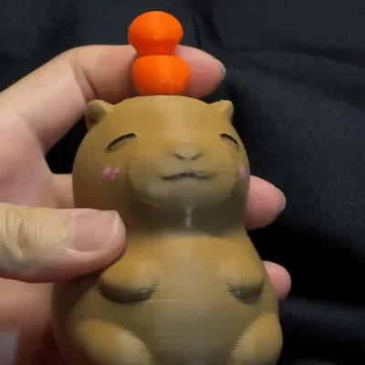 Mô hình Capybara với những quả cam xoay
