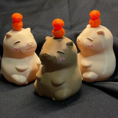Mô hình Capybara với những quả cam xoay