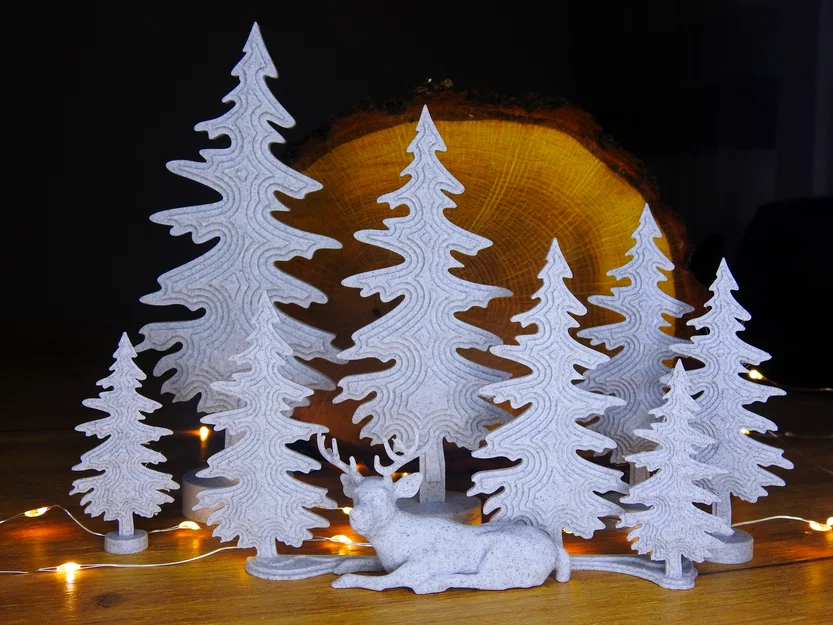 Chú nai nhỏ đang ngủ cùng những cây thông - Image 1