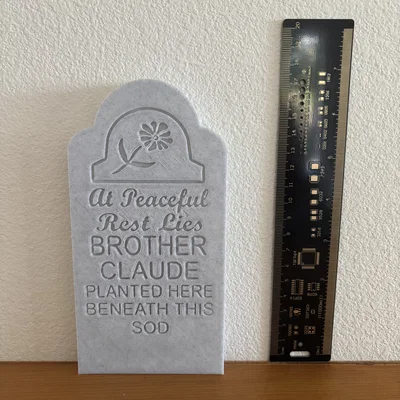 Mô hình bia mộ Haunted Mansion Brother Claude cho trang trí Halloween