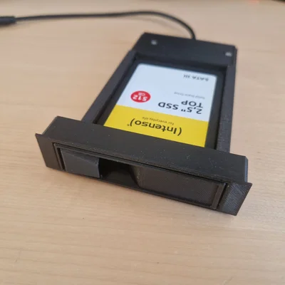 Drivebay hotswap 2.5" SATA với lò xo gài Print-in-Place