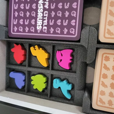Insert hộp game Happy Little Dinosaurs