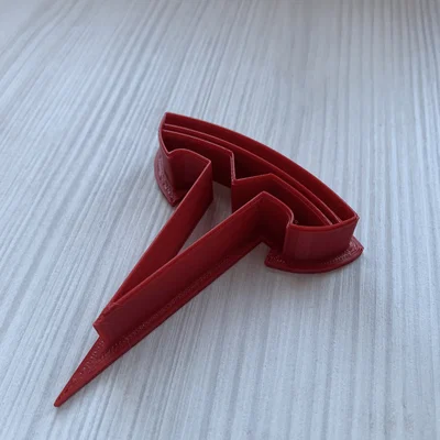 Khuôn cắt bánh quy hình logo Tesla độc đáo cho người hâm mộ