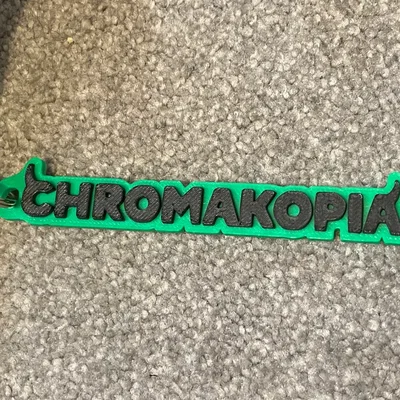Móc Khóa Chromakopia (Chromakopia Keychain)