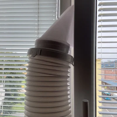 Ống xả máy lạnh ra cửa sổ thông gió