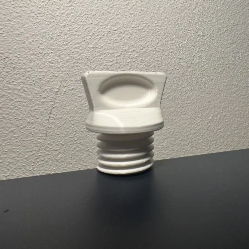 Nắp bình nước nóng (Hot Water Bottle Cap) - Image 1