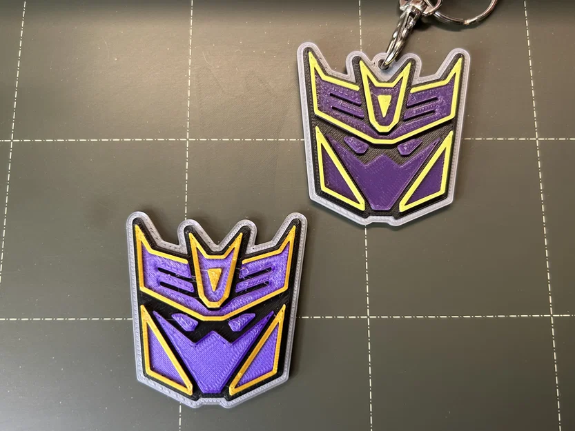 Huy hiệu & Móc khóa Transformers Megatronus Prime - Image 1