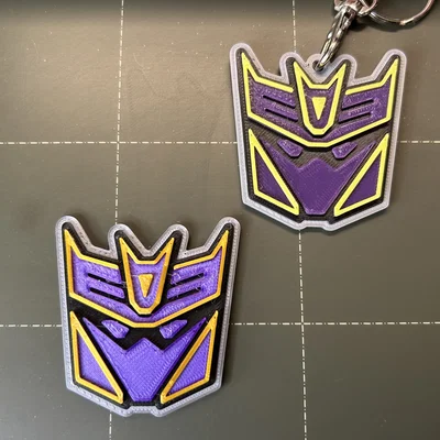 Huy hiệu & Móc khóa Transformers Megatronus Prime