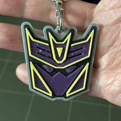 Huy hiệu & Móc khóa Transformers Megatronus Prime