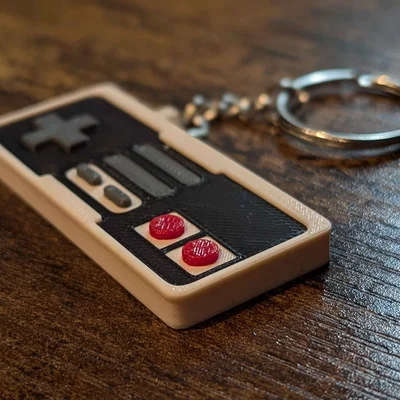 Móc khóa tay cầm NES in 3D phong cách retro hoài niệm