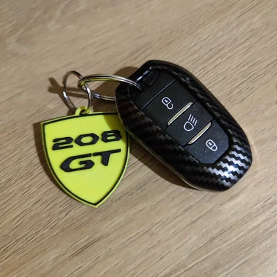 Móc khóa logo Peugeot mới & phiên bản GT