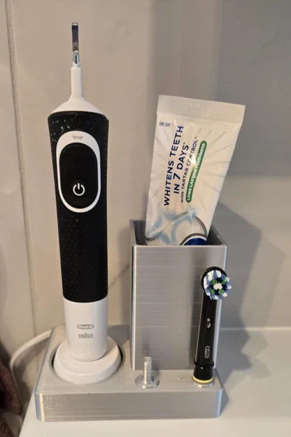 Giá đỡ bàn chải Oral B, kem đánh răng và bộ sạc - Image 1