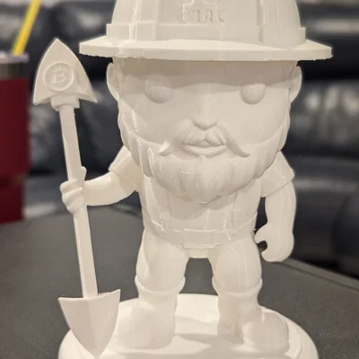 Tượng mô hình thợ đào Bitcoin (Bitcoin miner figurine)