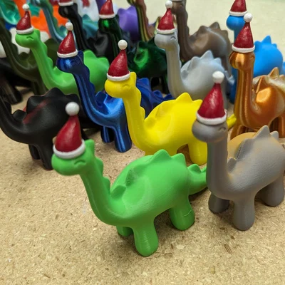 Mô hình khủng long Giáng sinh đáng yêu - Cute Stylized Dinosaur Santa