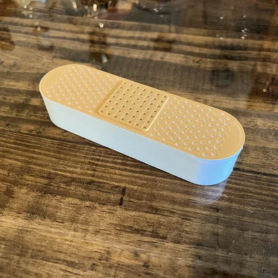 Hộp đựng băng cá nhân hình Band-aid với nắp trượt