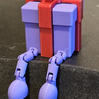 Hộp quà trang trí Giáng sinh với chân cử động linh hoạt