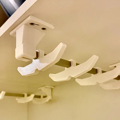 Giá treo quần áo dưới kệ dạng parametric