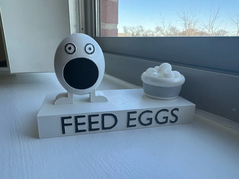 Mô hình game Feed Eggs từ "I Think You Should Leave with Tim Robinson" có đế nam châm - Image 1