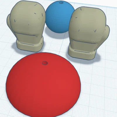 Mô hình găng tay boxing lò xo trang trí bàn làm việc