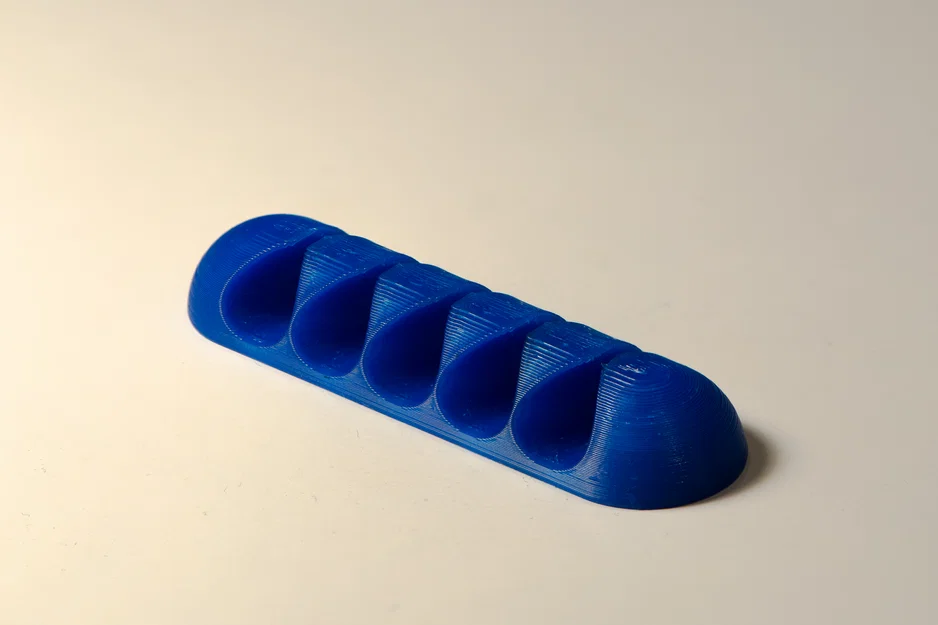 Kẹp giữ cáp bất đối xứng (Asymmetric cable holder) - Image 1