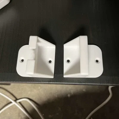 Držák na prodlužovací kabel (Giá đỡ dây nối dài)