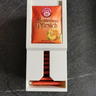 Hộp/giá lưu trữ túi trà xoay (Tea Storage)