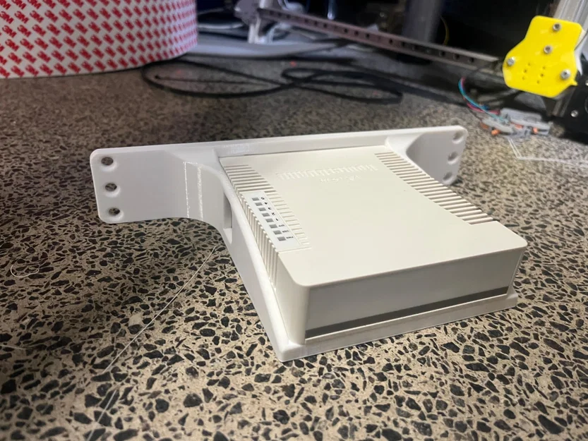 Ngàm gắn rack 10 inch cho MikroTik hEX và RD2x0GS - Image 1