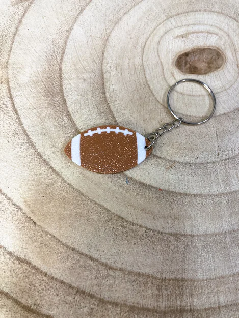Móc khóa hình quả bóng bầu dục (American Football) in 3D độc đáo - Image 1