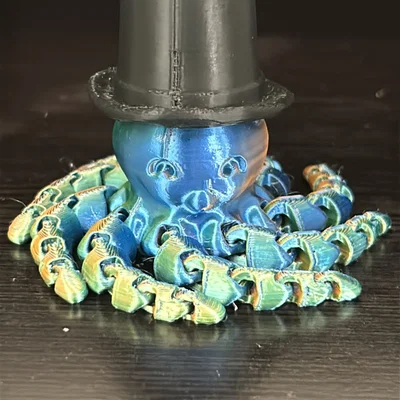 Mô hình bạch tuộc khớp nối đội mũ (Flexi Octopus with a Top Hat) in 3D
