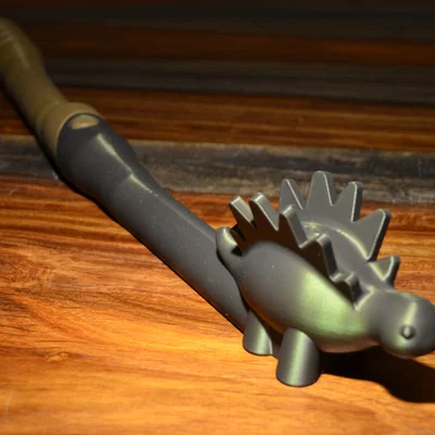 Cây Gãi Lưng Khủng Long (Dinosaur Back Scratcher)