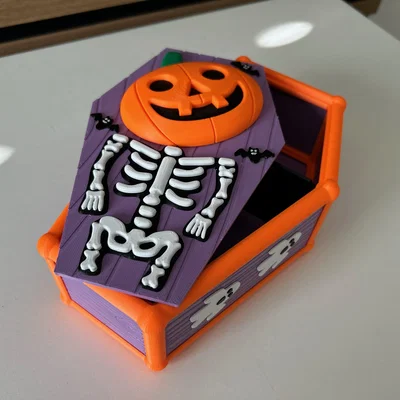 Hộp Kẹo Halloween Hình Quan Tài Cho Bé (Khóa Mở Bằng Đầu Bí Ngô)