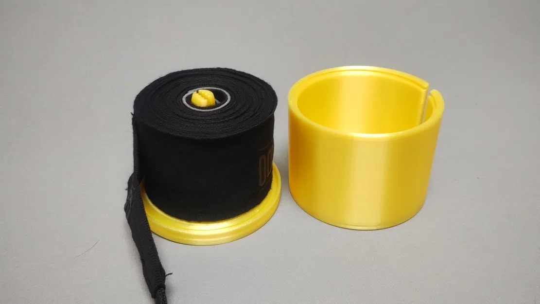 Hộp/Con lăn cuộn băng quấn tay Boxing (Boxing wrap roller / container) - Image 1