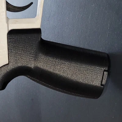 Tay cầm AR-15 góc giảm MIG 1.1 có ngăn chứa (MIG Reduced Angle AR 15 style Grip)