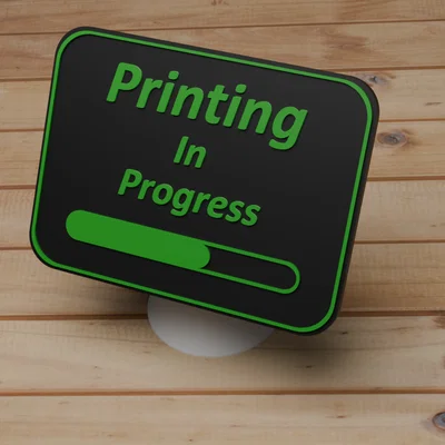 Bảng hiệu “Printing In Progress” (có progress bar) để báo máy đang in