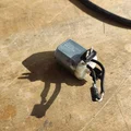 VW Caddy – Chi tiết mở cửa khoang hàng (cargo door opener) - Thumbnail 10