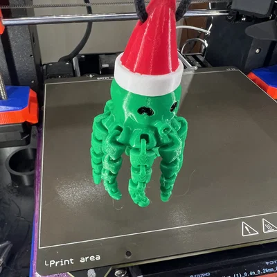 Mô hình bạch tuộc Flexi Octopus đội mũ Noel trang trí Giáng sinh